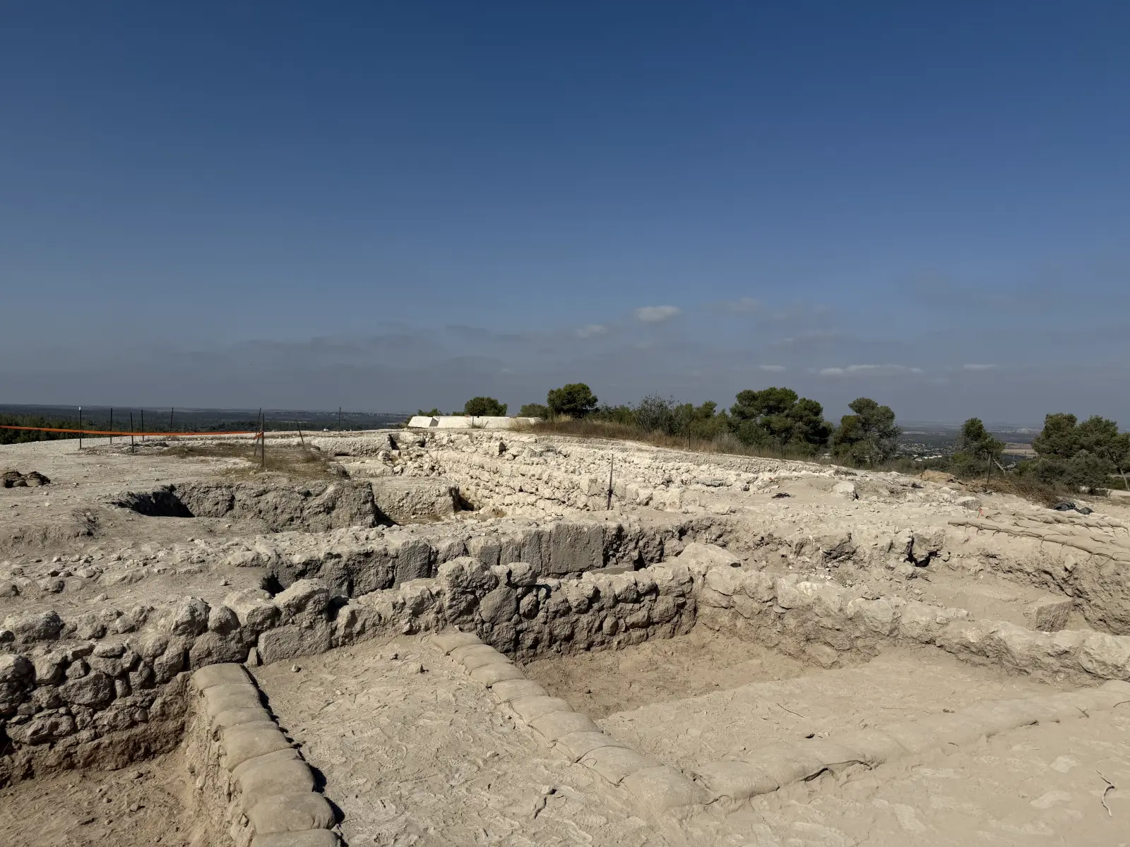 Tel Azekah: Excavated rooms exposed across the area.