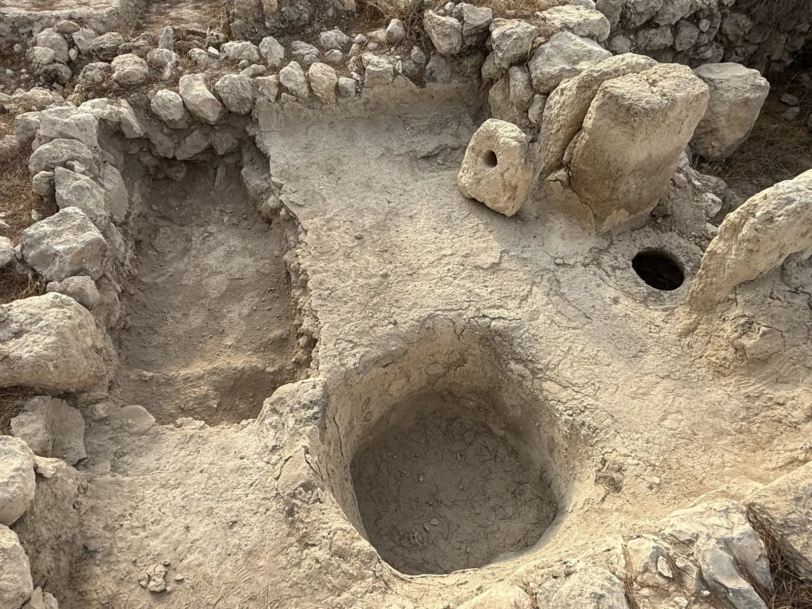 Tel Azekah: Rock-cut basins and installations in bedrock.