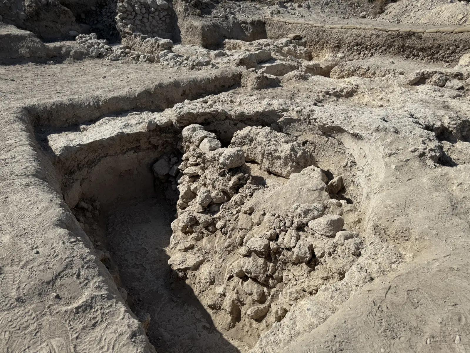 Tel Azekah: Room walls with stone fill still in place.