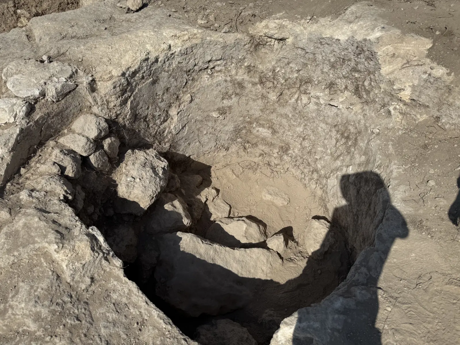 Tel Azekah: Circular stone-lined pit.